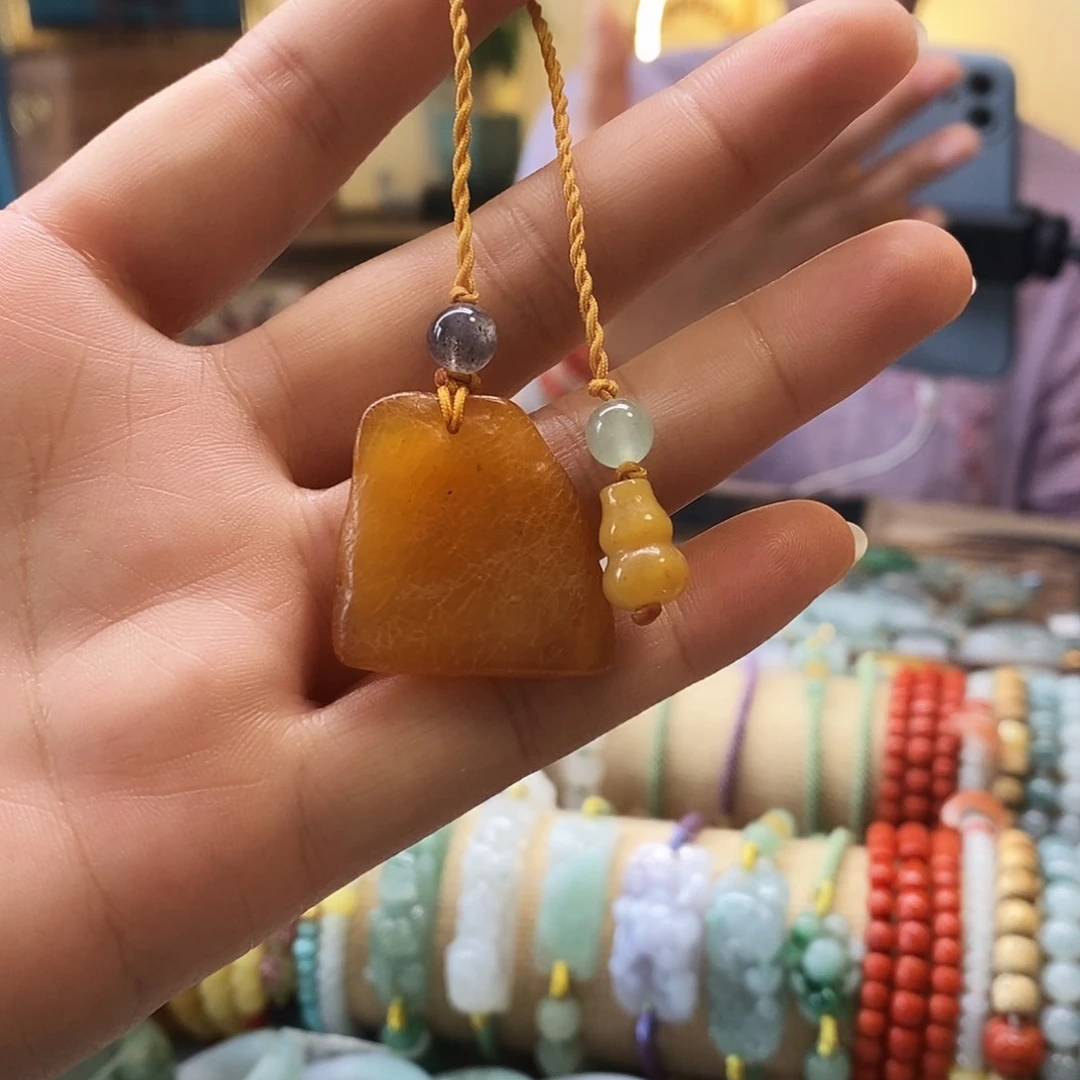 未镶嵌颈饰琥珀冰****?蜜蜡手机挂