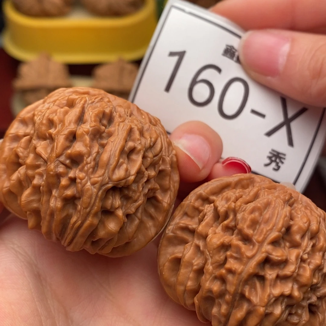 桃核把件汗高楼43……