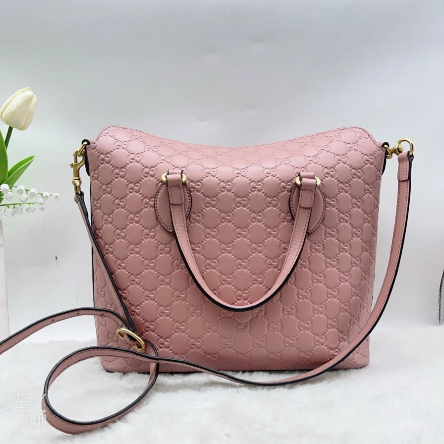 95新 GUCCI/古驰 粉色压花手提斜挎包 1244 1898