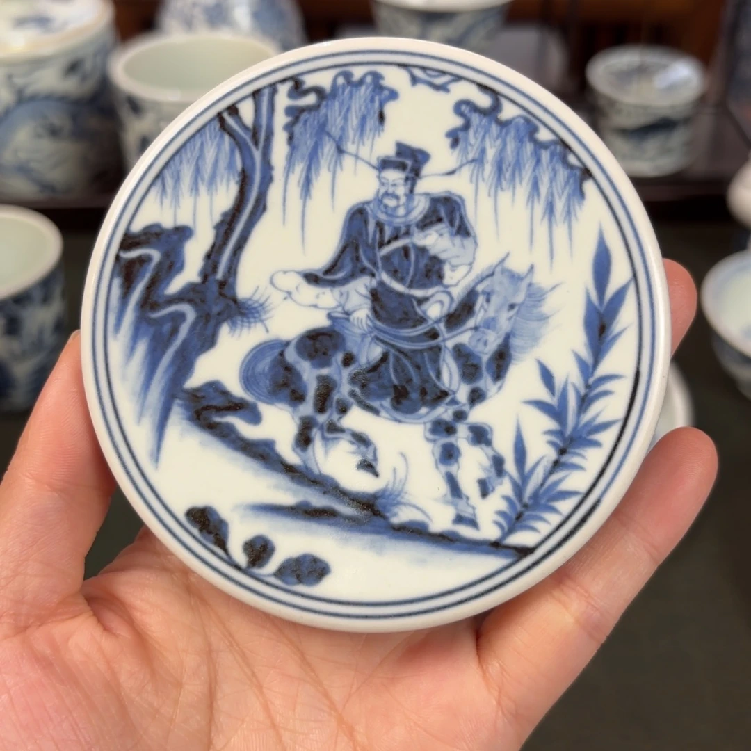 陶人物盖置博陵造物