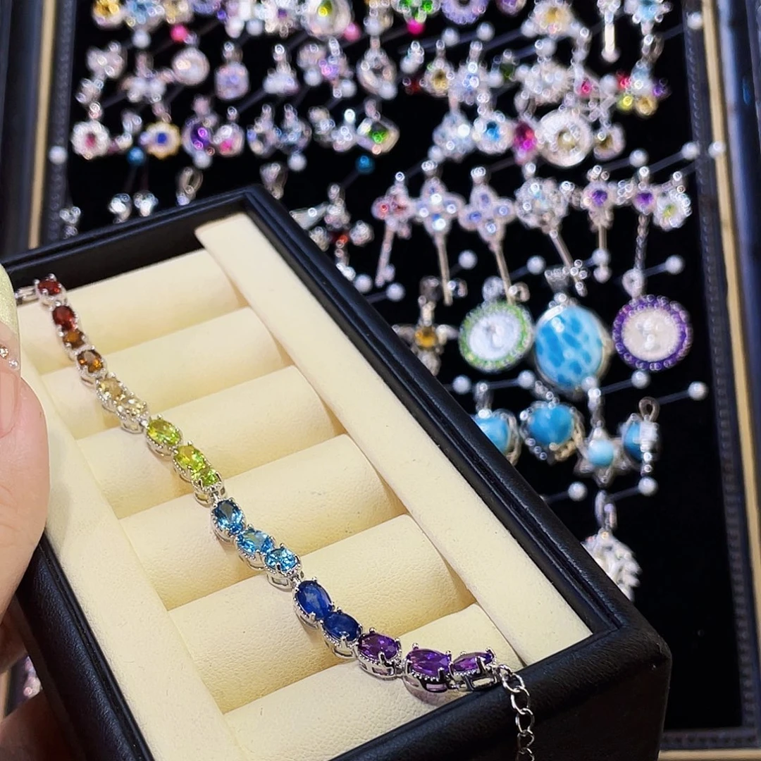 汐****合成立方氧化锆925银多宝手链