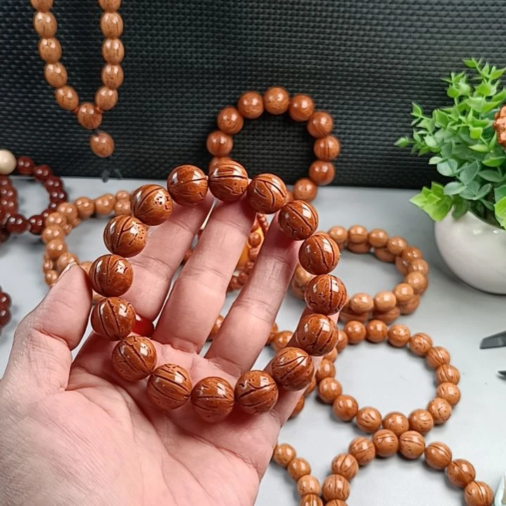 桃核手串铁籽密纹黄皮15