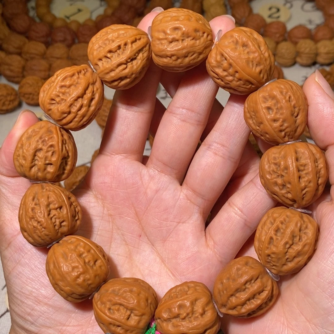 桃核吊坠红皮子弹头