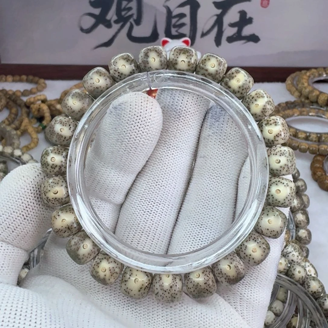 手串星月菩提10×9同枝丹凤眼  1076