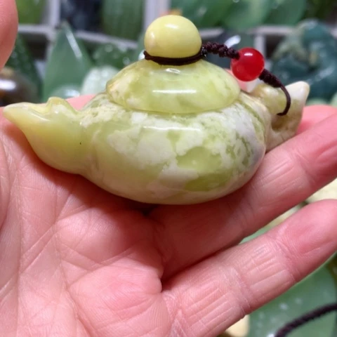 蛇纹石玉手把件未镶嵌