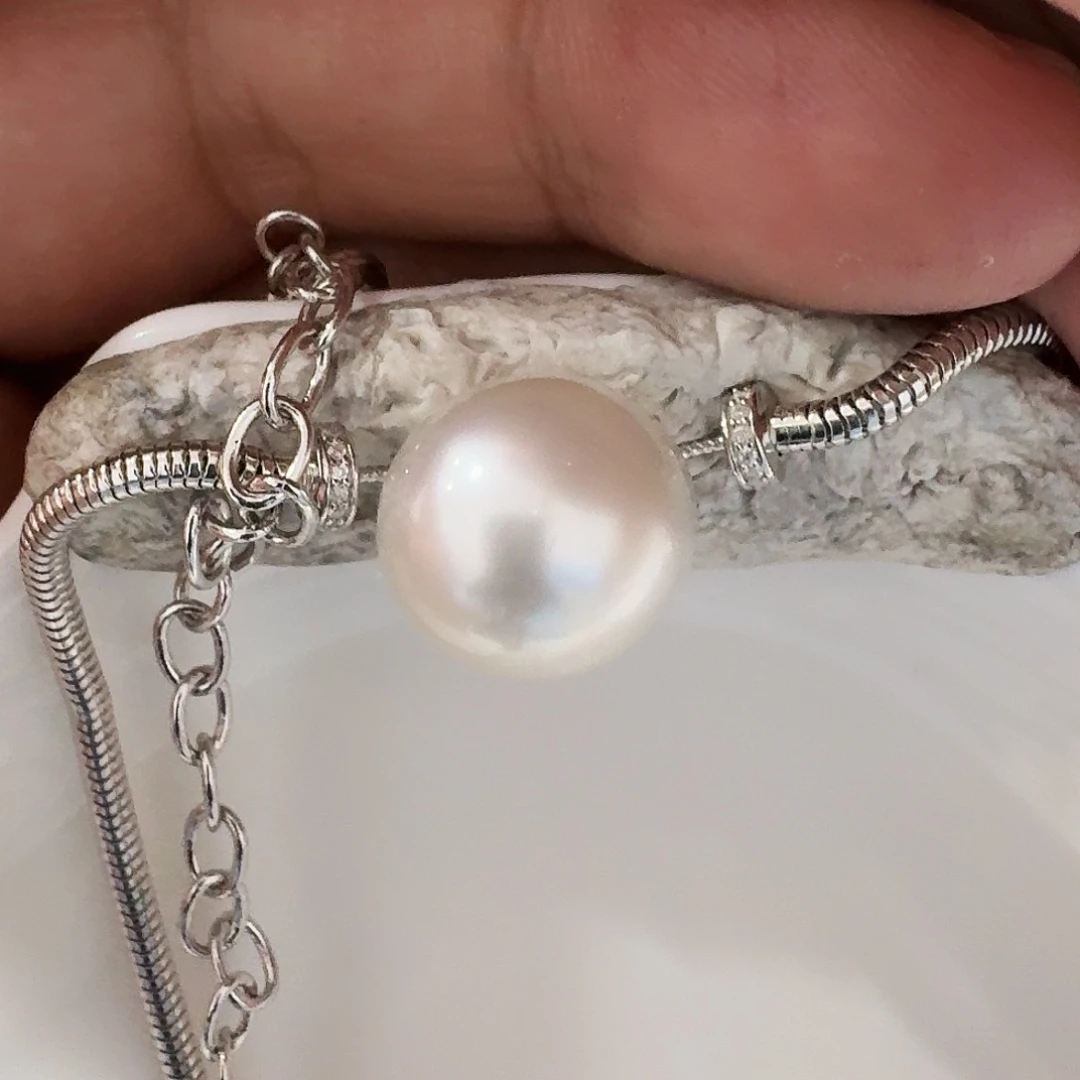 汤***X海水珍珠银S925镶嵌吊坠(赠链)