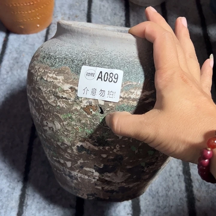 089瑕疵有孔高20口14