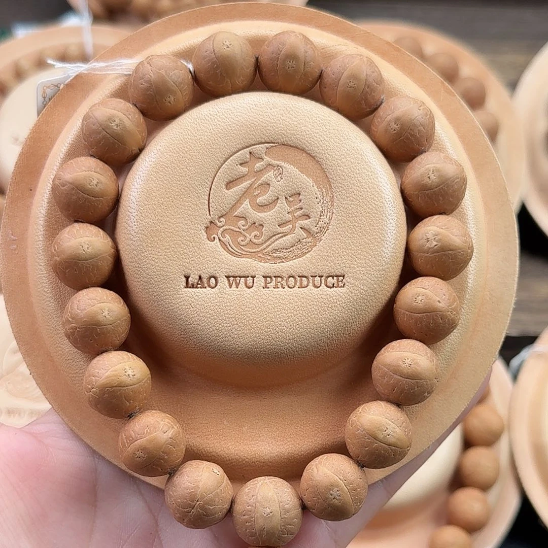 曼****凤眼菩提吊坠精品头货14.5mm正圆大眼玉化皮质