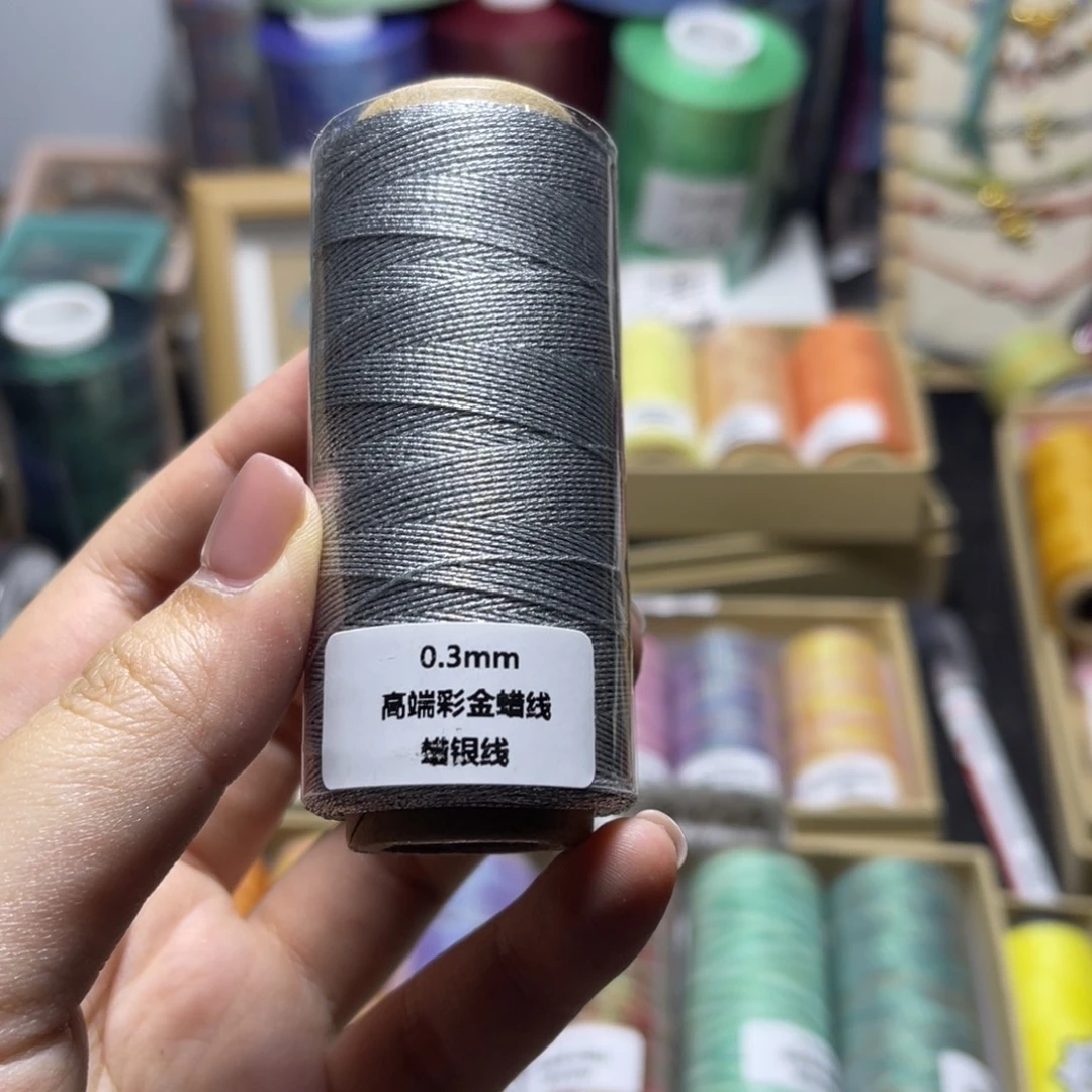 腈纶0.3高端彩金蜡线银色一卷