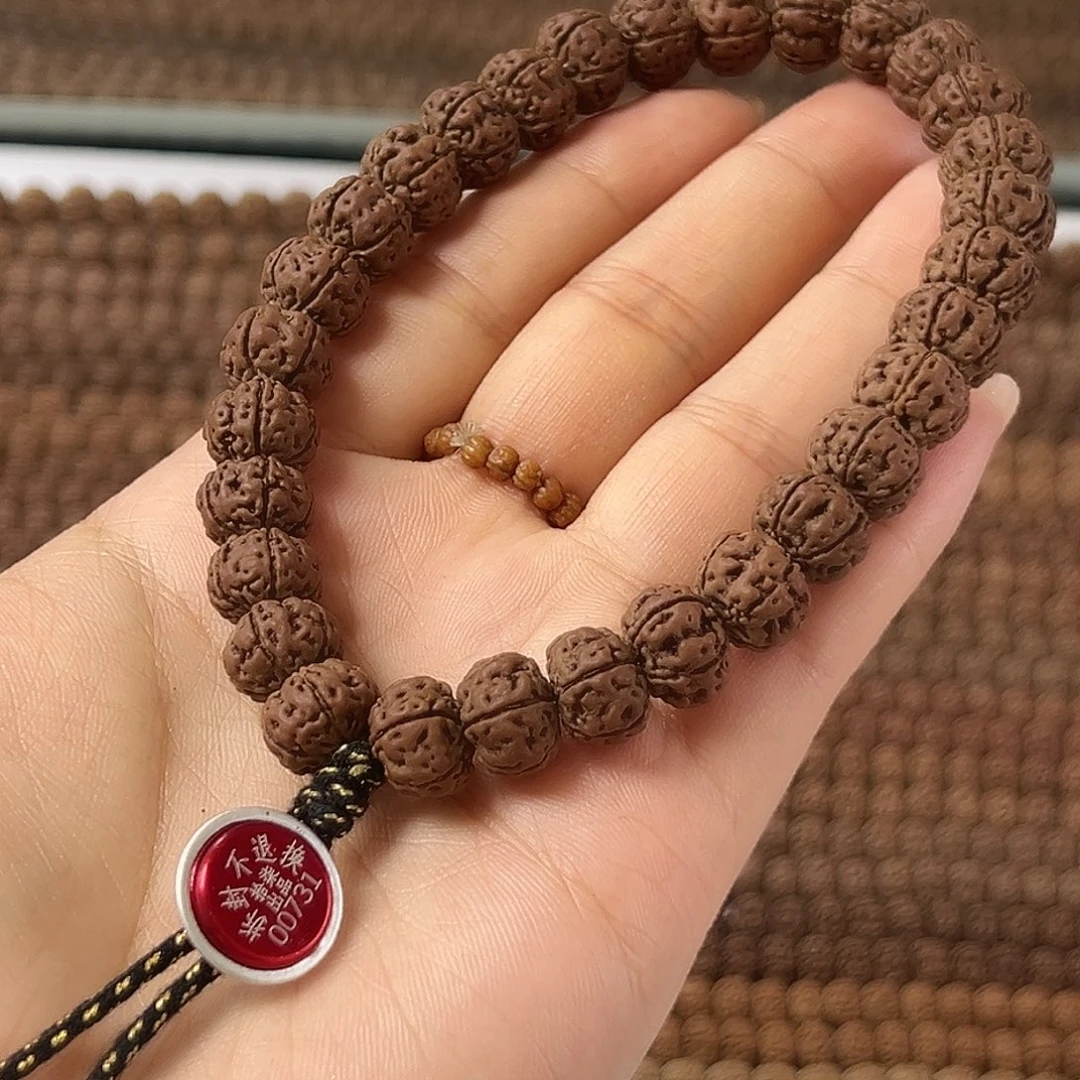 T***w金刚菩提吊坠老树王手串