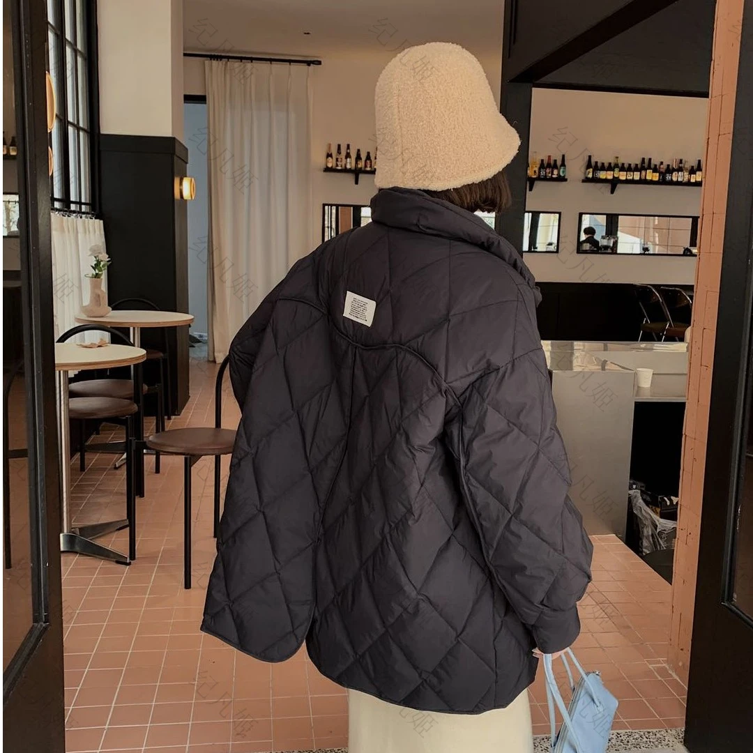 纪凡姬/8014-韩版中长款大纽扣不规则门襟设计羽绒服