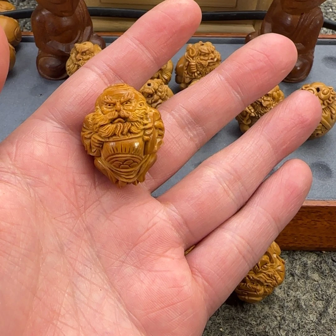 橄榄核吊坠麟***3……………………