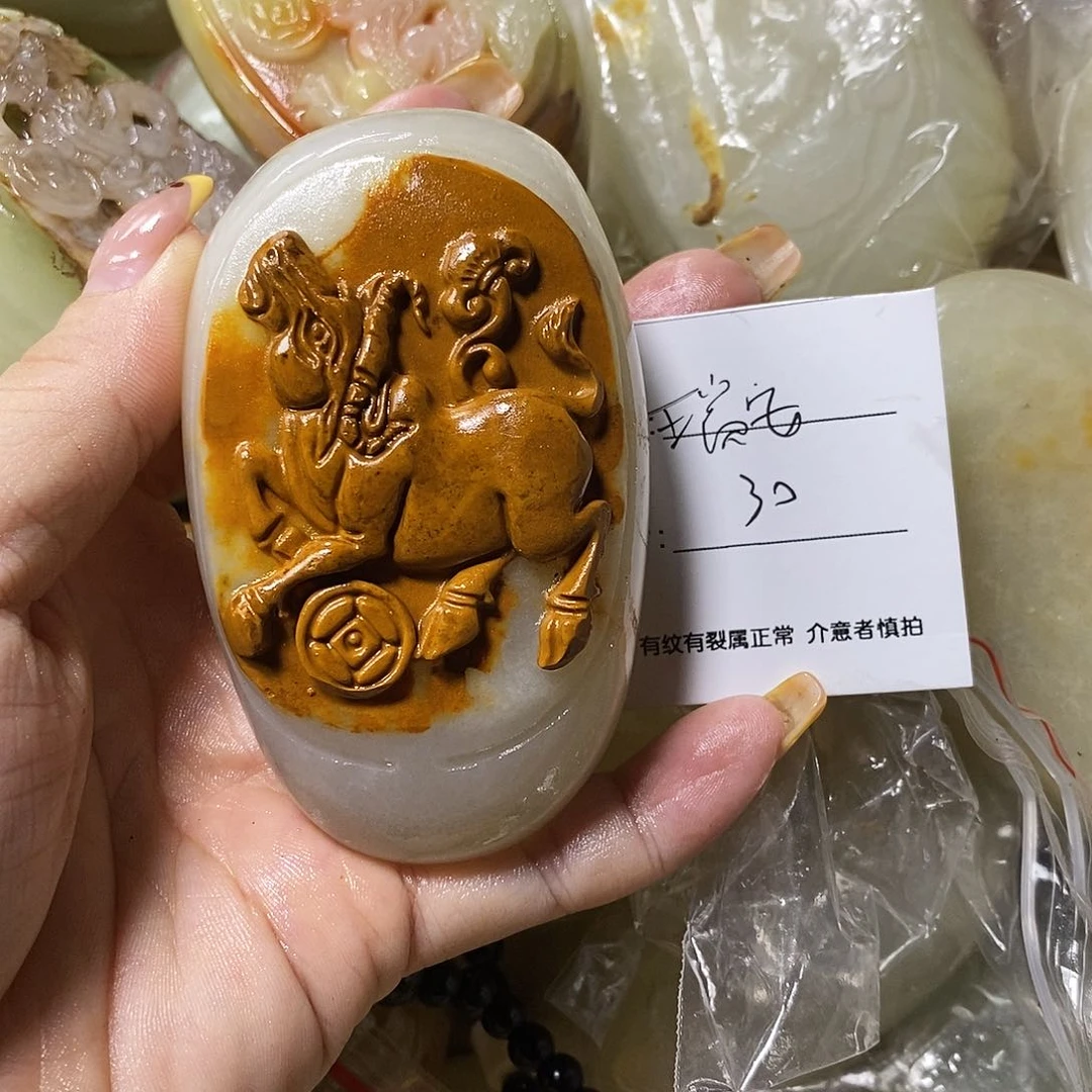 石材瑞****作古青石手把件