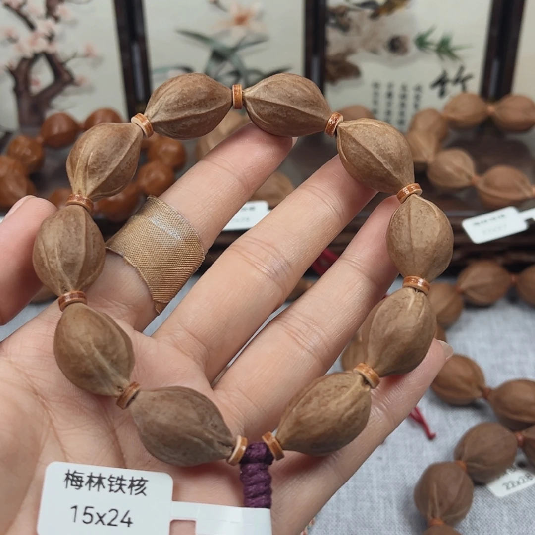 金***桥橄榄核吊坠梅林铁核25.24