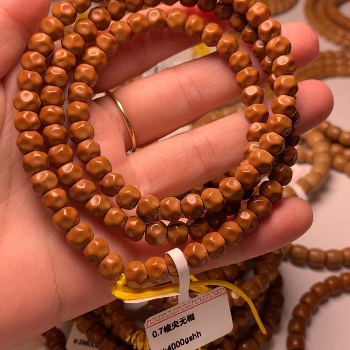 纳***悦吊坠橄榄核核尖无相