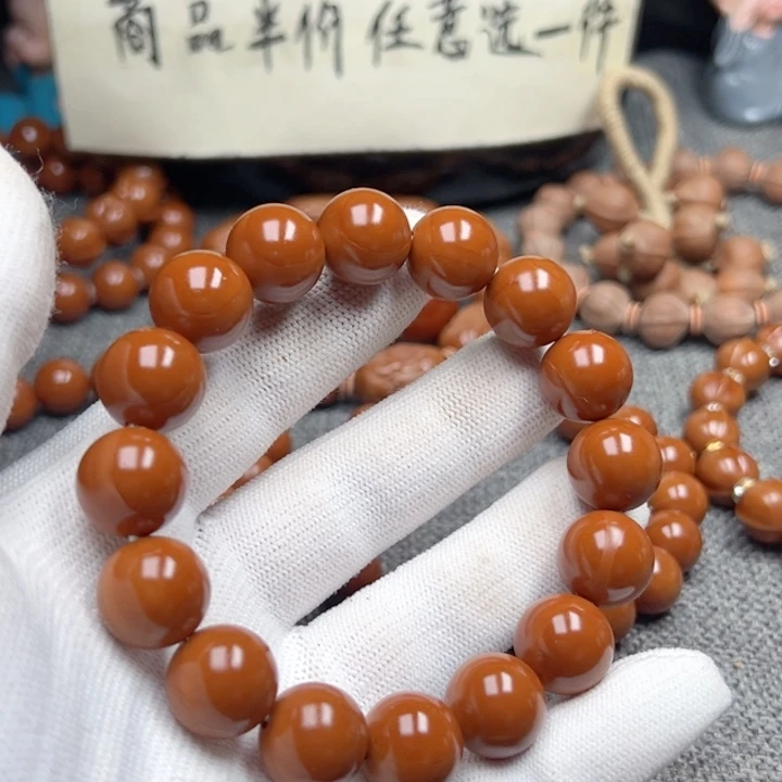 钱***生橄榄核手串1.39全品小孔