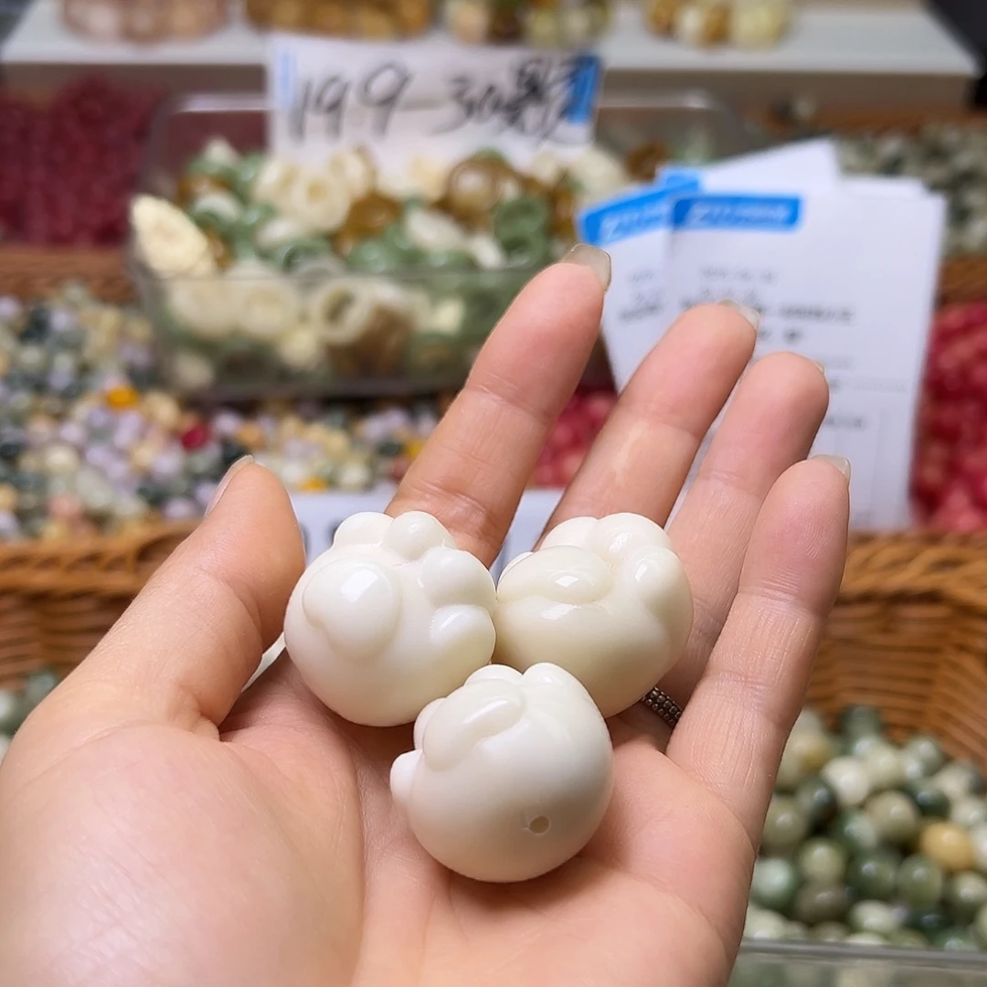 柚***茶菩提根/象牙果手串瑕疵爪3颗表面孔道有裂