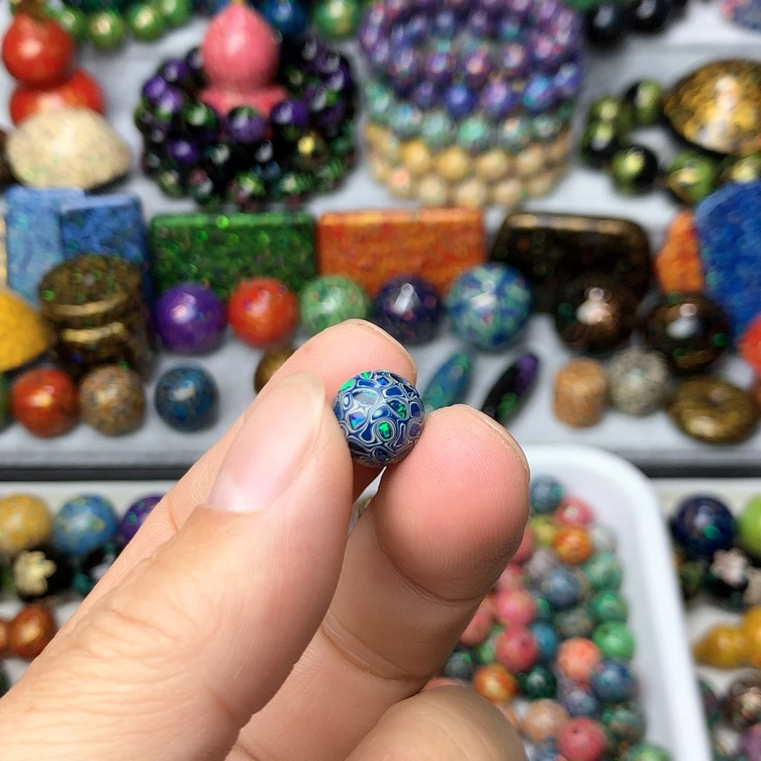 铭**哈一颗1.0+欧珀大漆珠子