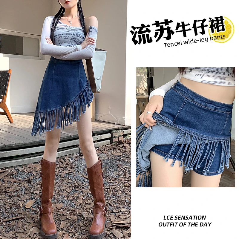 乔栈辣妹斜边流苏边牛仔半身裙女2025夏季新款不规则复古包臀短裙