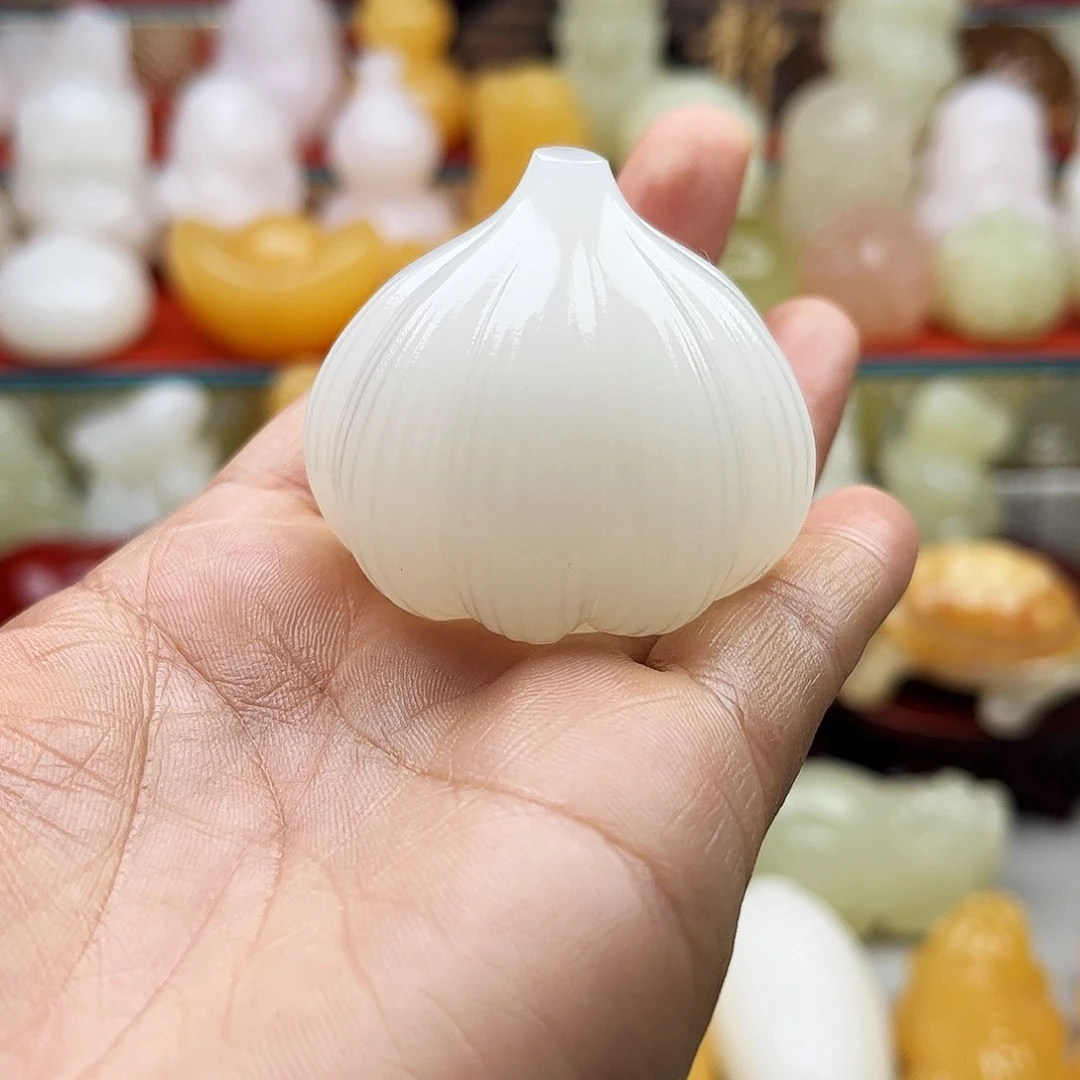 小***奶石材大蒜手把摆件