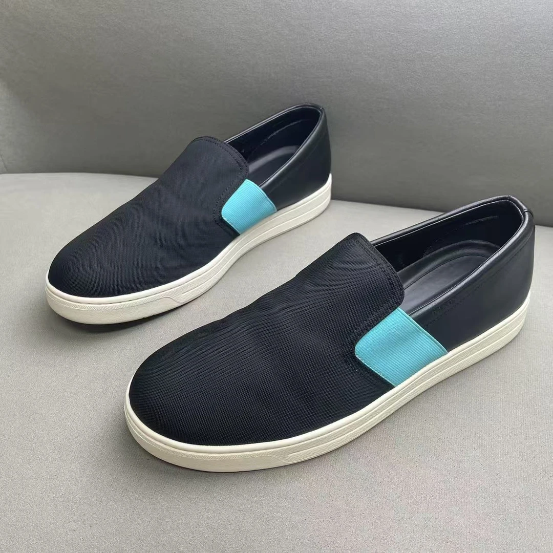 95新 Prada/普拉达 黑蓝拼色网面时尚百搭透气低帮一脚蹬 43码