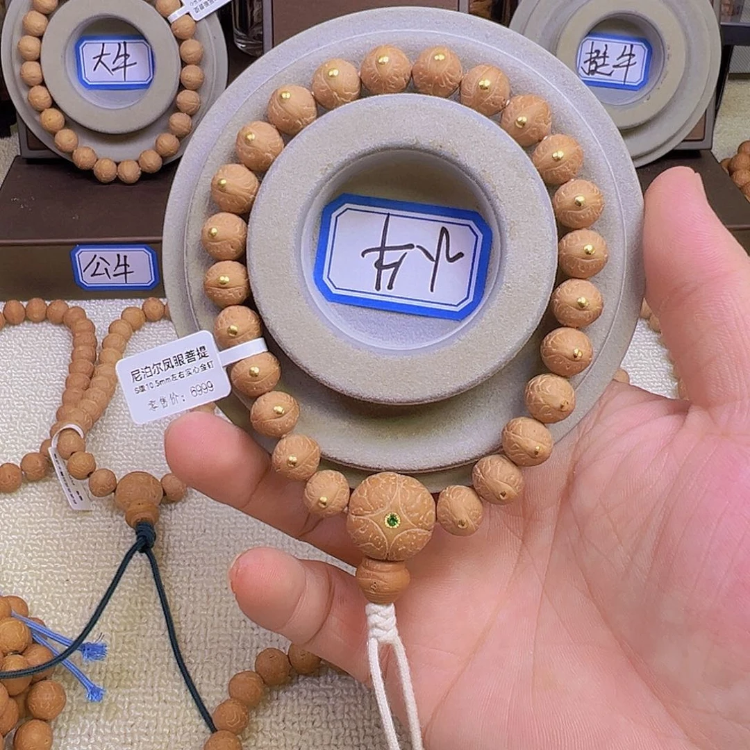 H***h手串凤眼菩提10.5mm左右镶嵌金钉