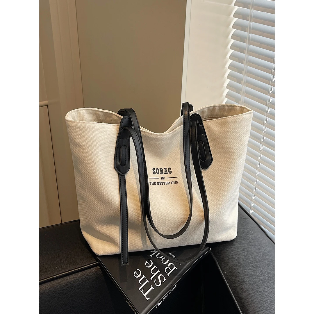 休闲大容量帆布包包女2025新款通勤百搭单肩包大学生上课包托特包