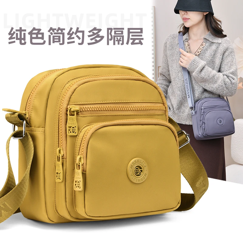 简约轻便多隔层斜跨女包2025防水潮流单肩手机包耐磨时尚通勤女包