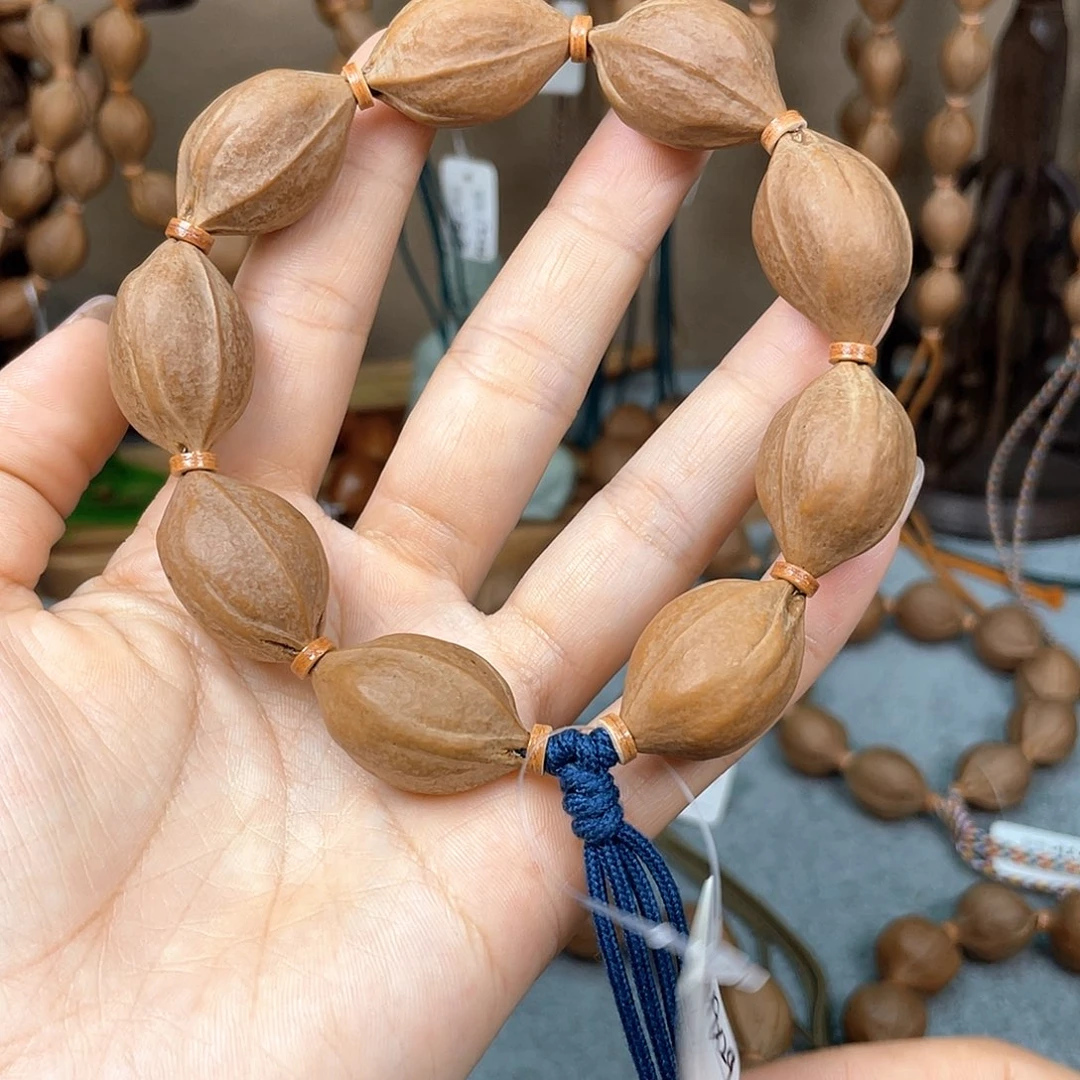 手串橄榄核今****）梅林铁核1929福利