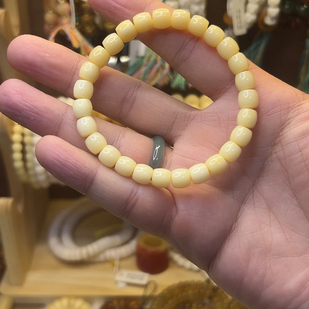 懋***默吊坠桃核0.8直切驼牙