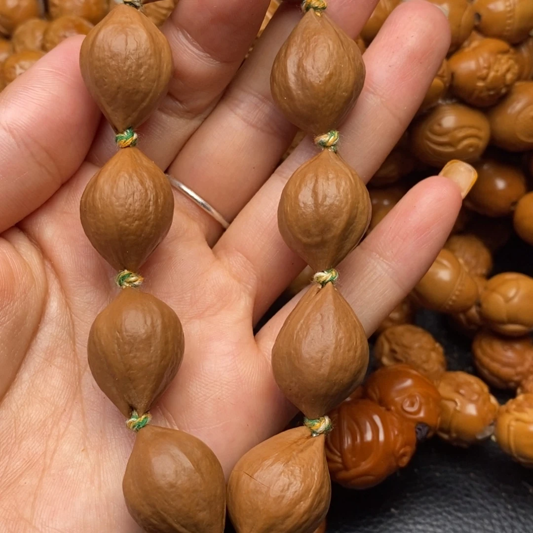 橄榄核手串三花素核