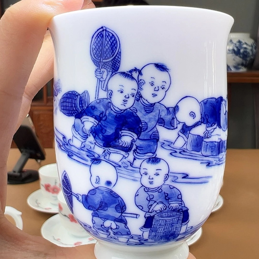 青花童子大铃铛杯