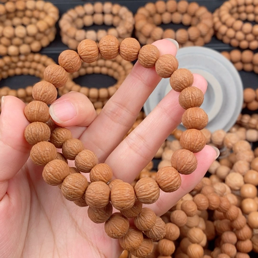 猴头核桃手串微瑕麒麟凤羽