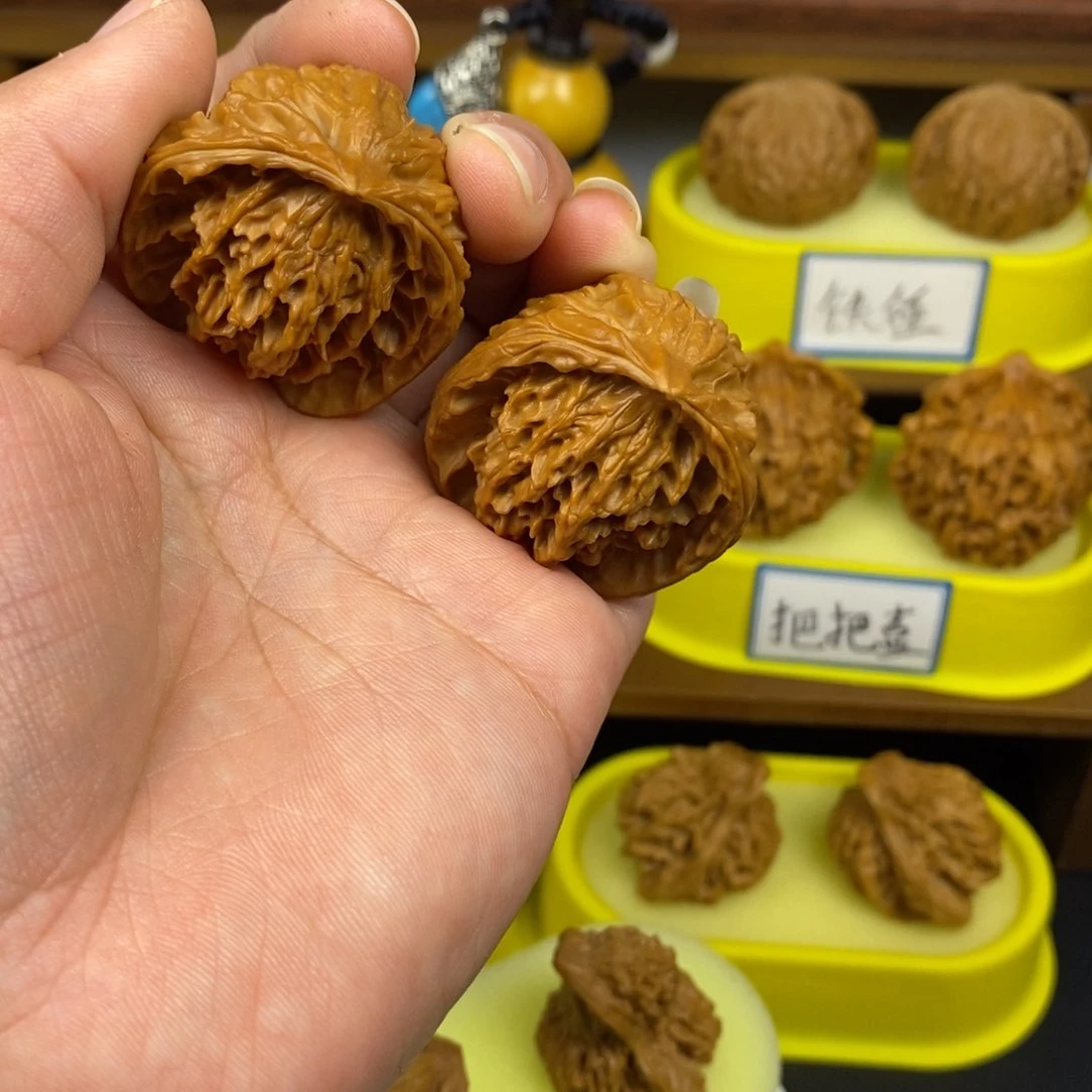 核桃M****李蛇头 文玩/木作/... 文玩把件