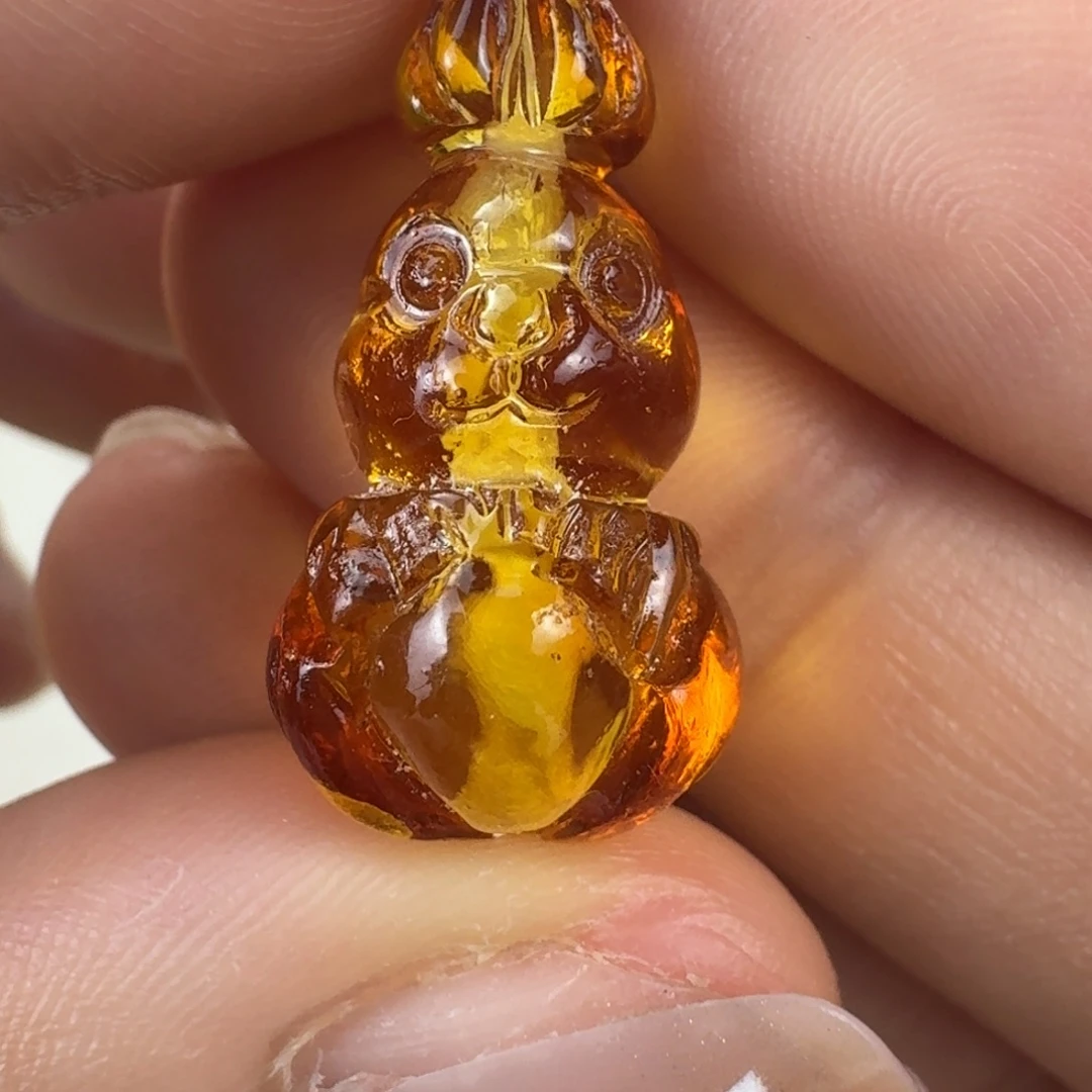 蜜蜡未镶嵌珠宝奇石全品通孔 25×12×11.4mm