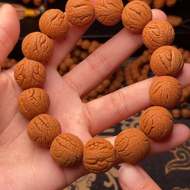 手串桃核金丝龙珠1.6