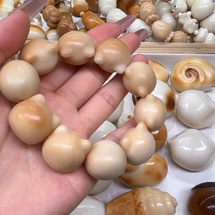 白玉菩提把件5.13.72象牙果老师傅猫头微瑕