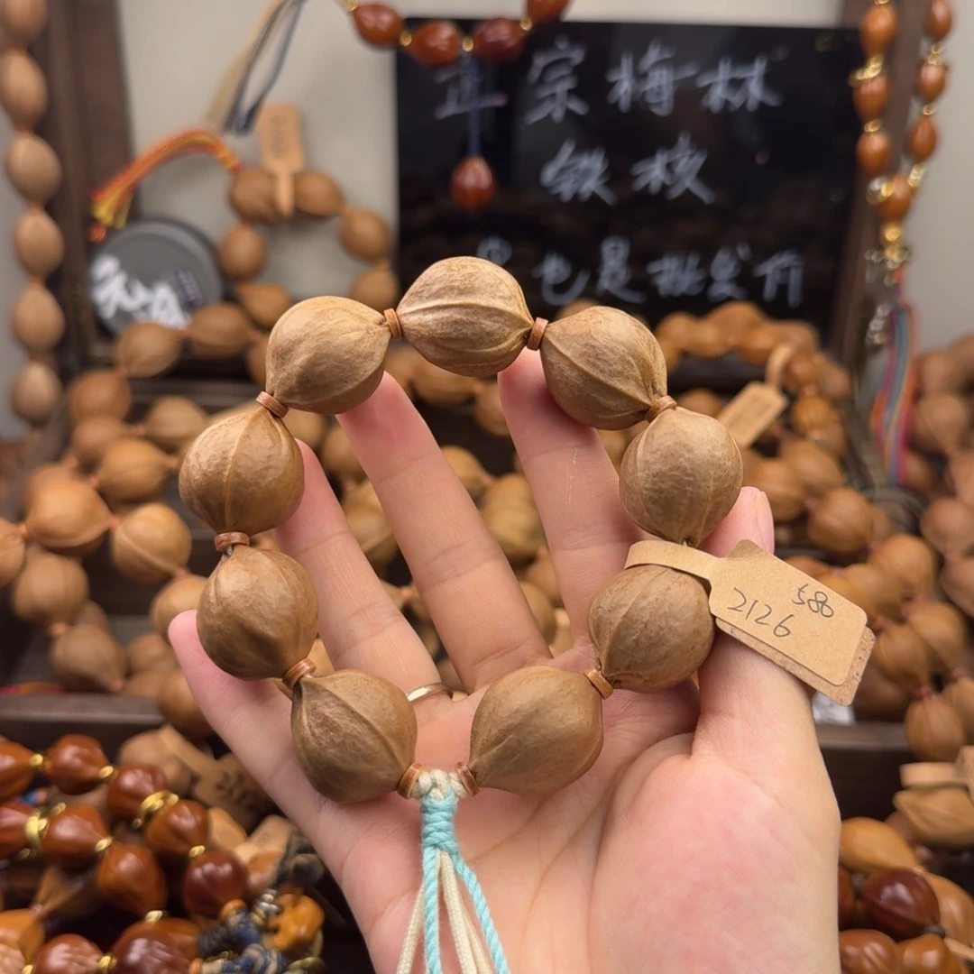 咩***点手串橄榄核21.26尺寸