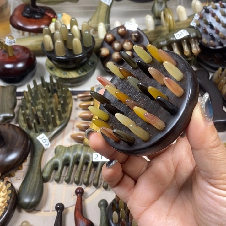 紫光檀28齿羊角按摩梳