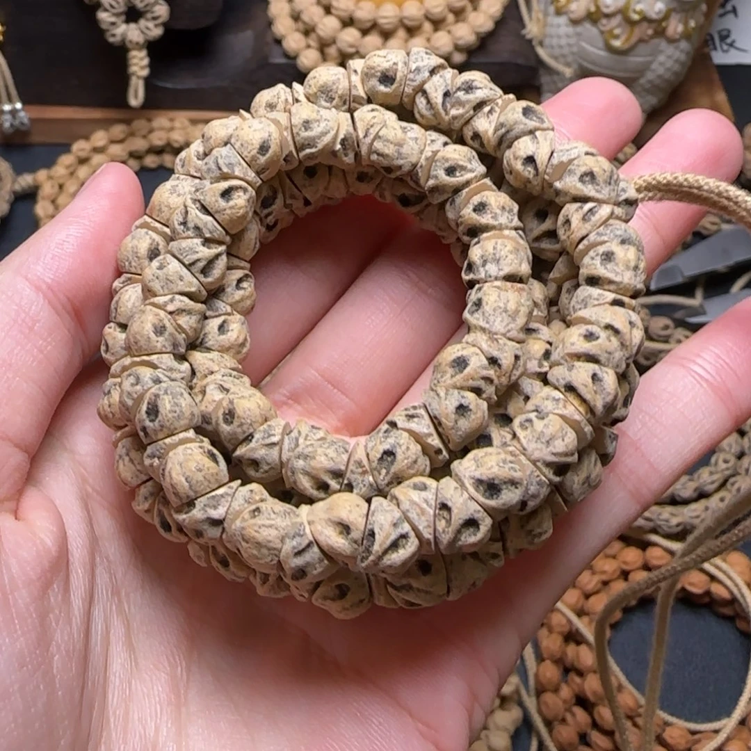 舟***游柏香籽/百香籽吊坠