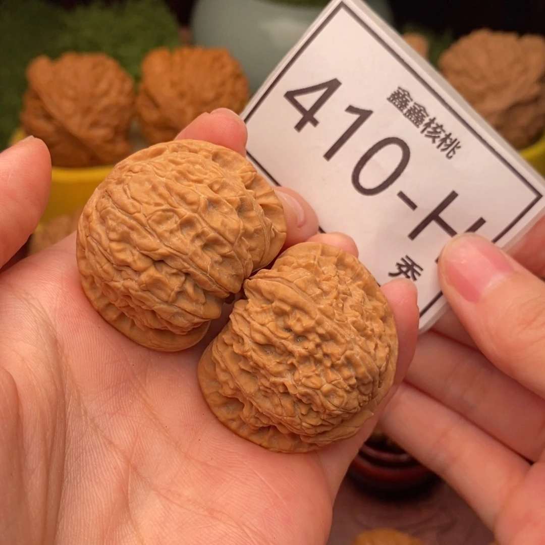 文玩核桃把件梅***怪白狮38