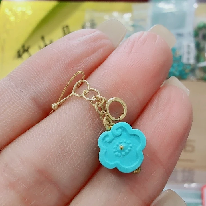 噢***了绿松石18K金镶嵌珠宝奇石