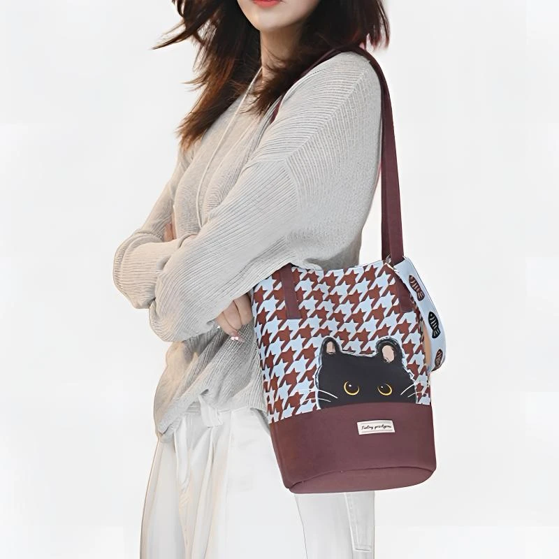 艺术鸭原创千鸟格小煤球单肩斜跨手提水桶包通勤大容量帆布包包女
