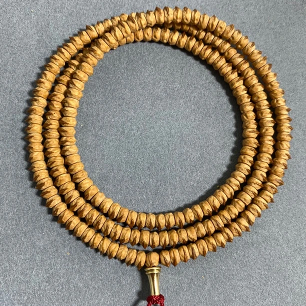 5mm赤焰红唇百香籽鬼脸手串红芽口文玩脖挂