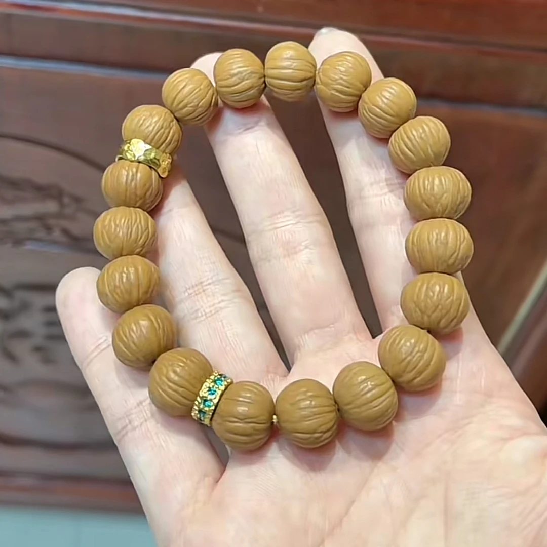 1.2cm原皮原色无泡药猴头桃核手串