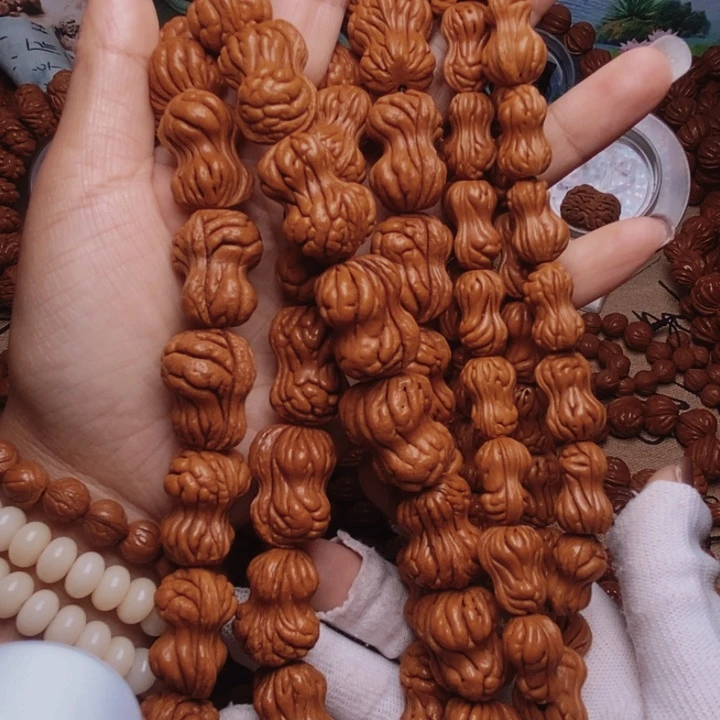 合***呈文玩核桃手串龙纹桃核
