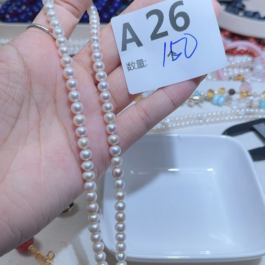 妮***赵珠宝奇石淡水珍珠未镶嵌A26。