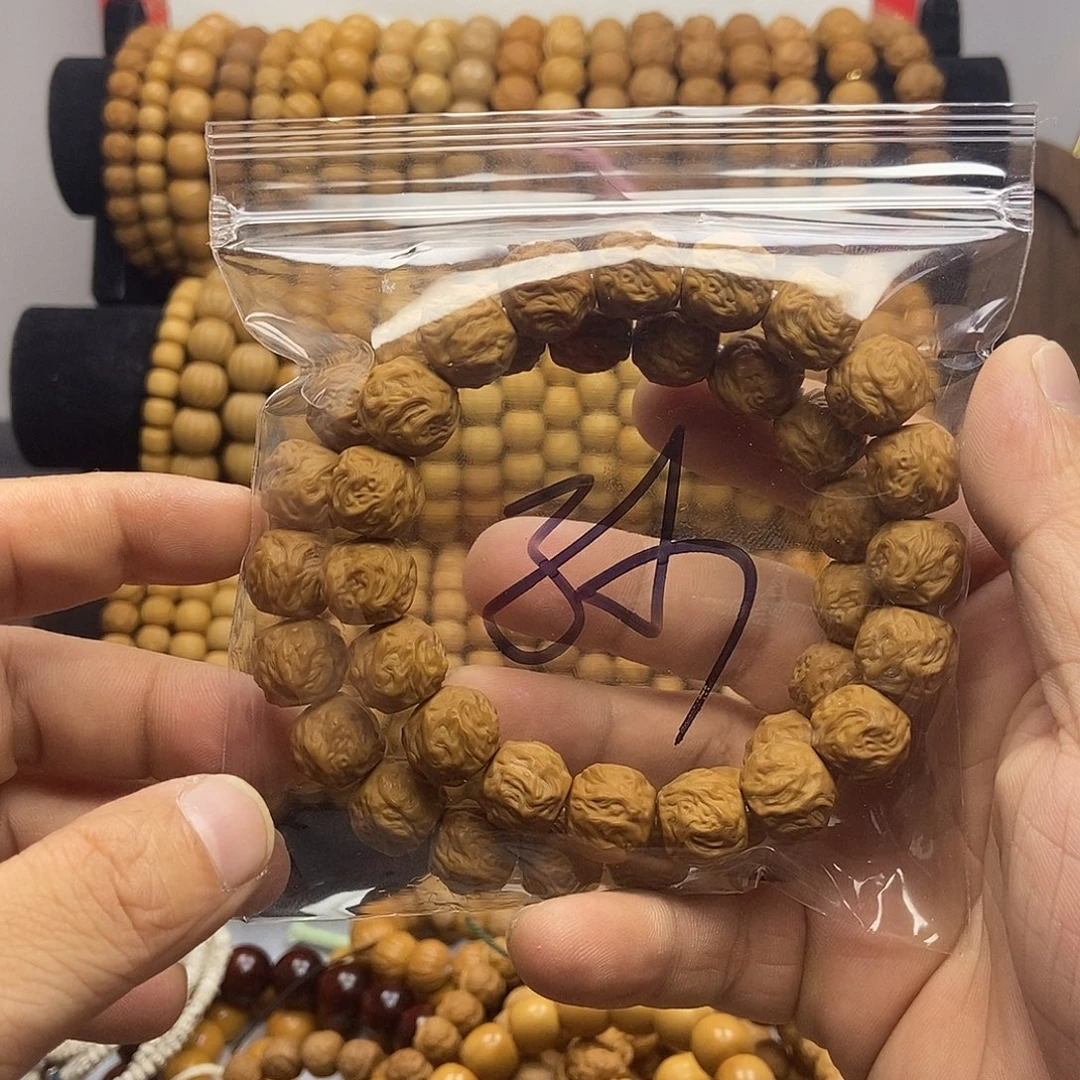 孙****手串猴头核桃微微瑕龙蛇手串两条