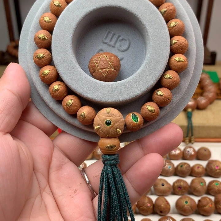 岱***泽凤眼菩提吊坠手串