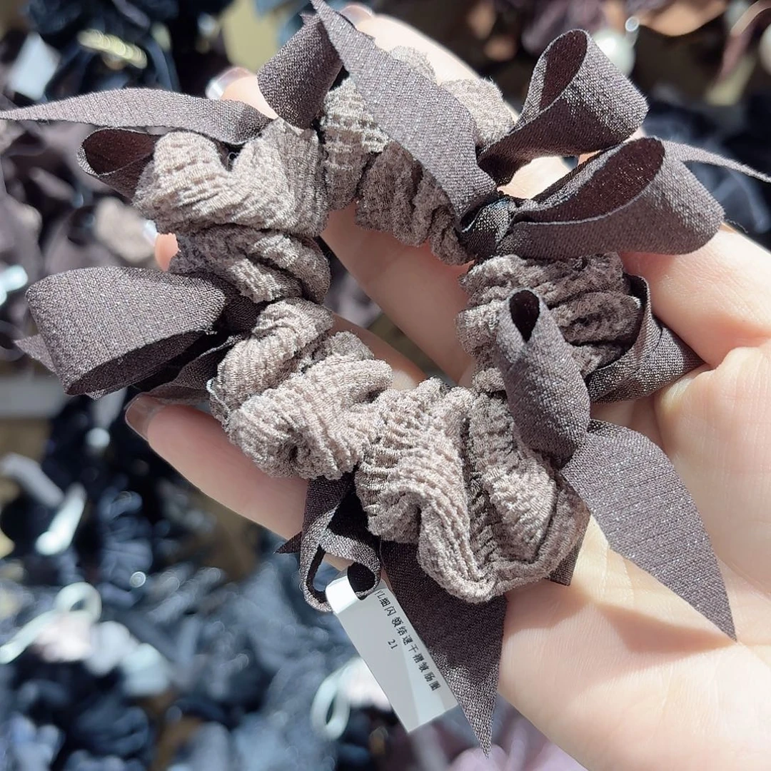 皮质铁合金咖色蝴蝶结